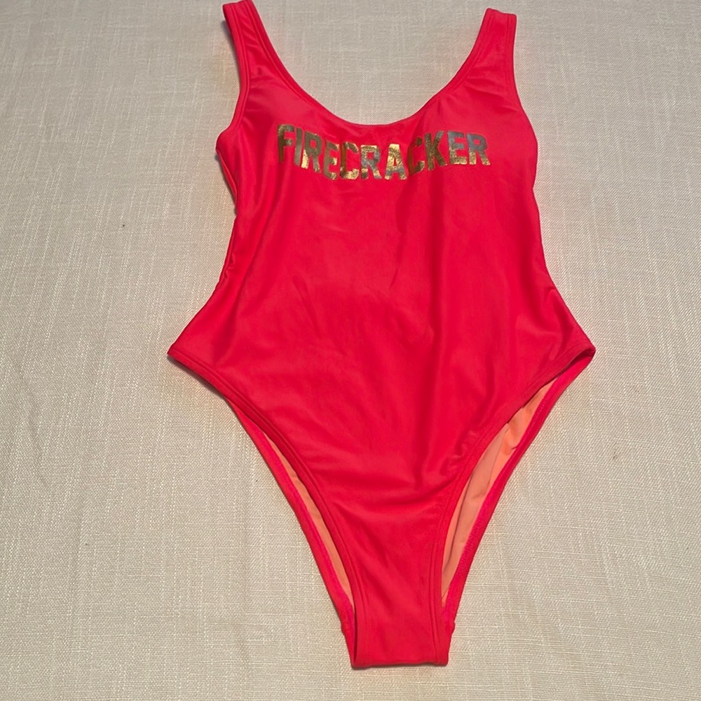 NEW. Size small one piece